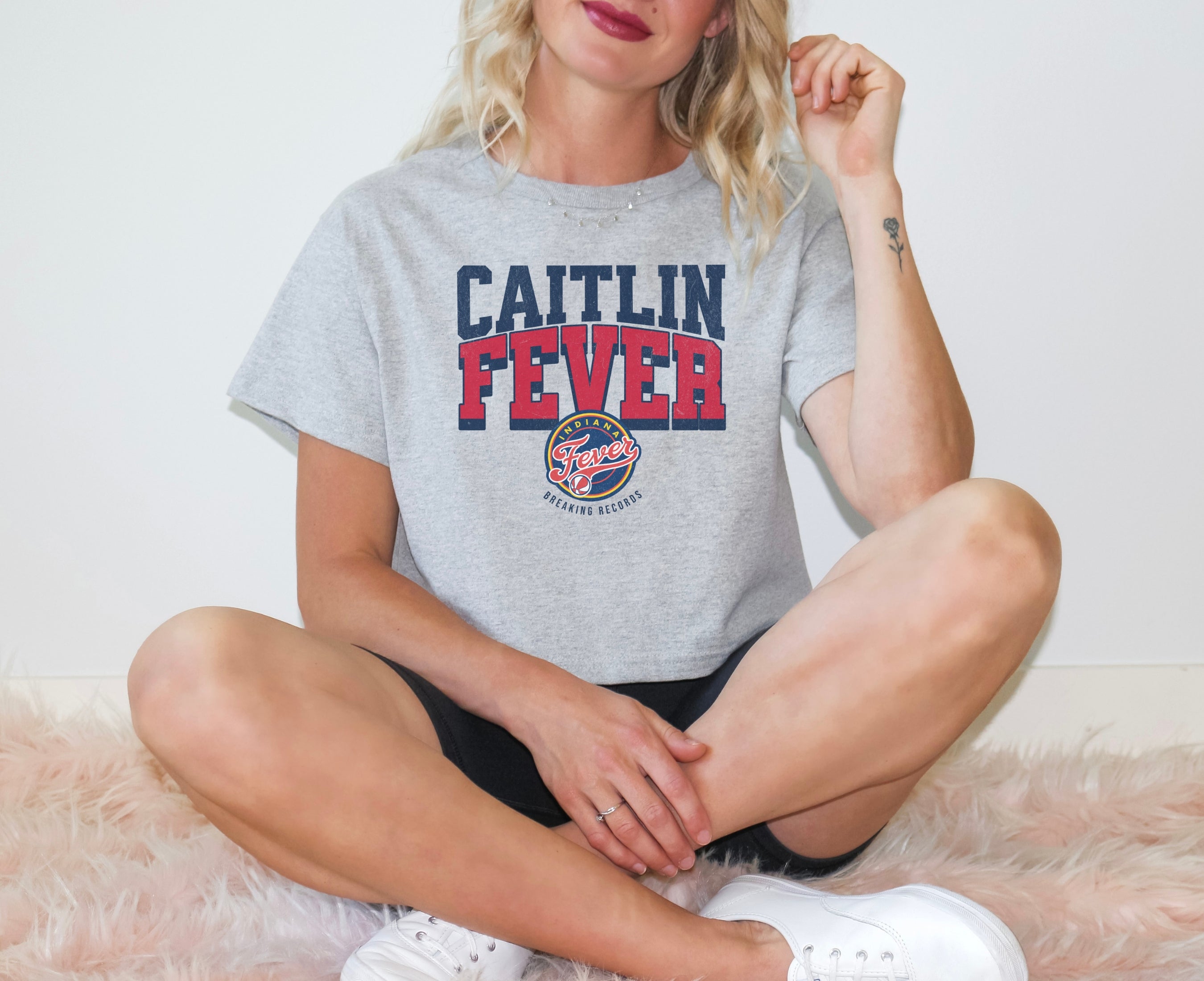 Girl wearing Caitlin Fever Crop Top t-shirt in athletic heather