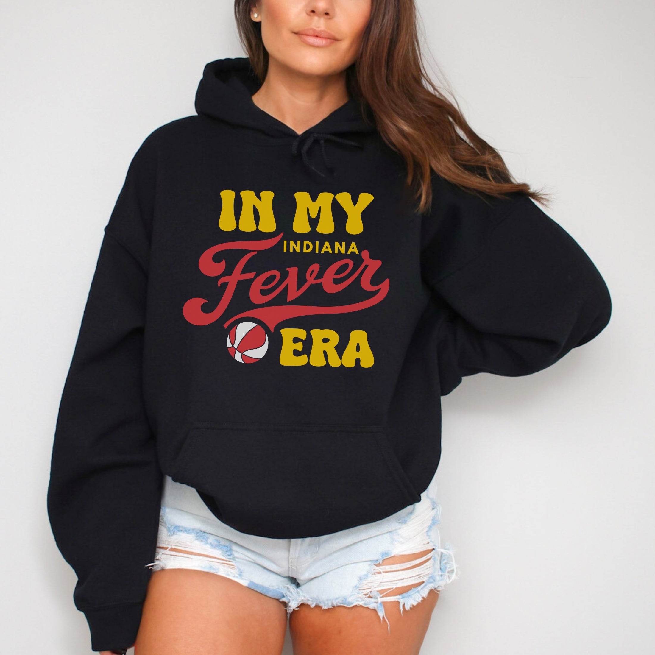 Girl wearing black in my Fever era hoodie