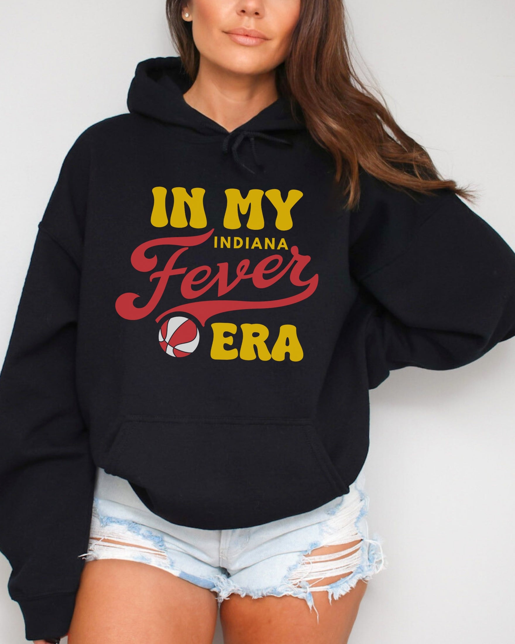 Girl wearing black in my Fever era hoodie