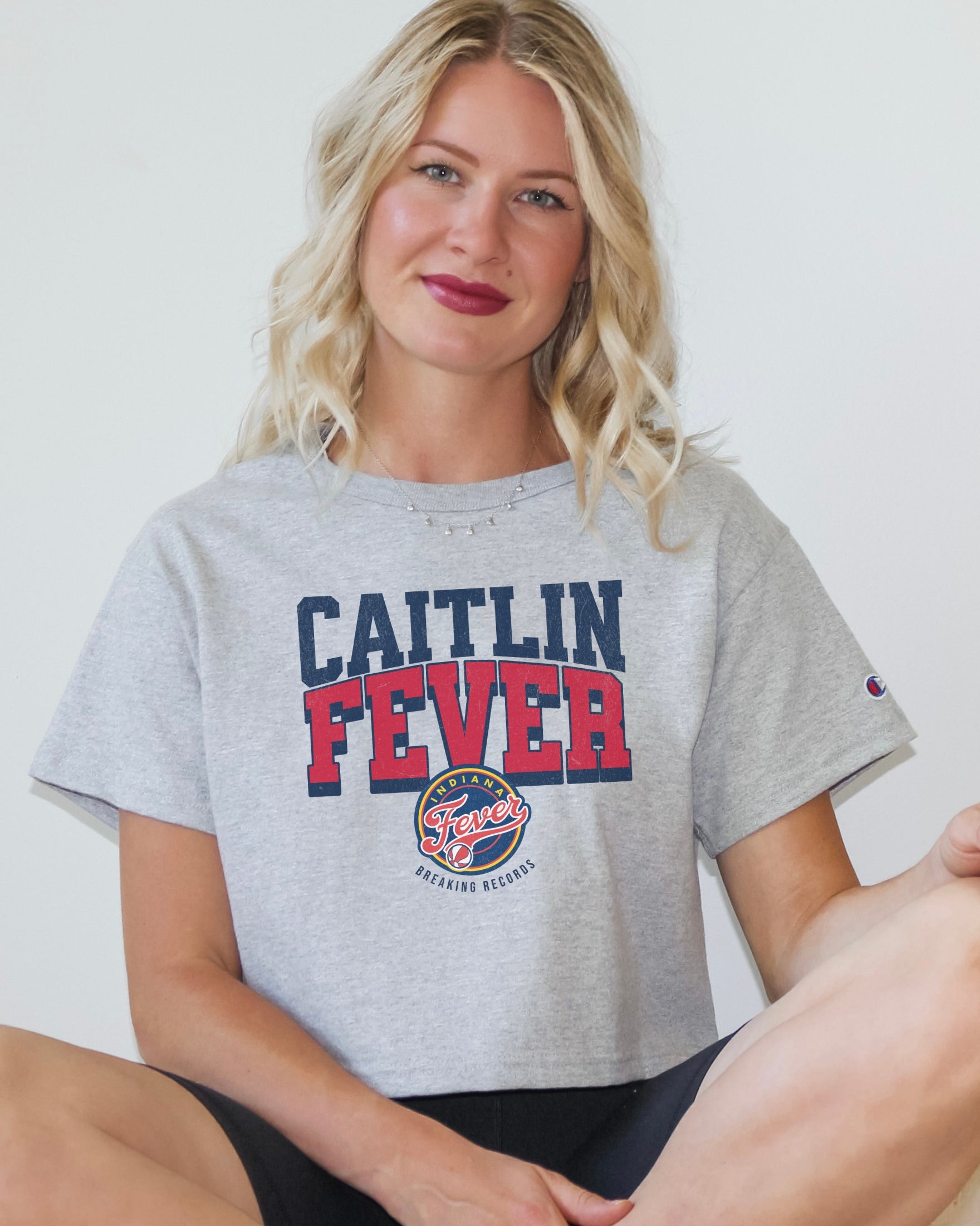 Girl wearing Champion Caitlin Fever Crop Top in athletic heather