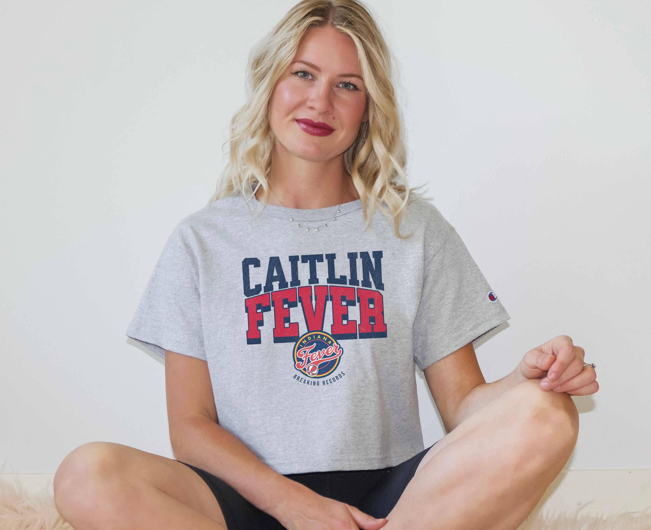 Girl wearing Champion Caitlin Fever Crop Top in athletic heather