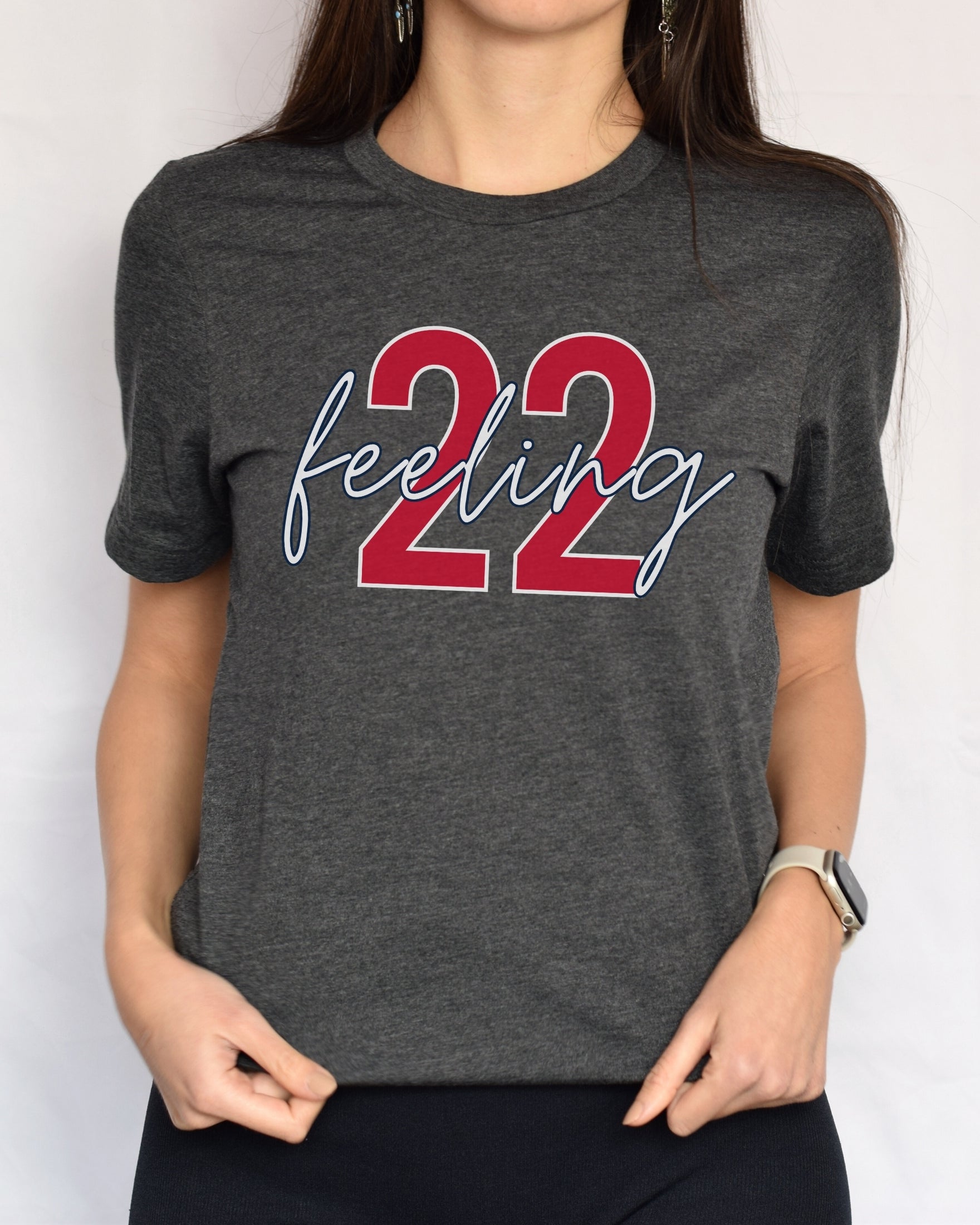 Girl wearing dark grey heather feeling 22 t-shirt