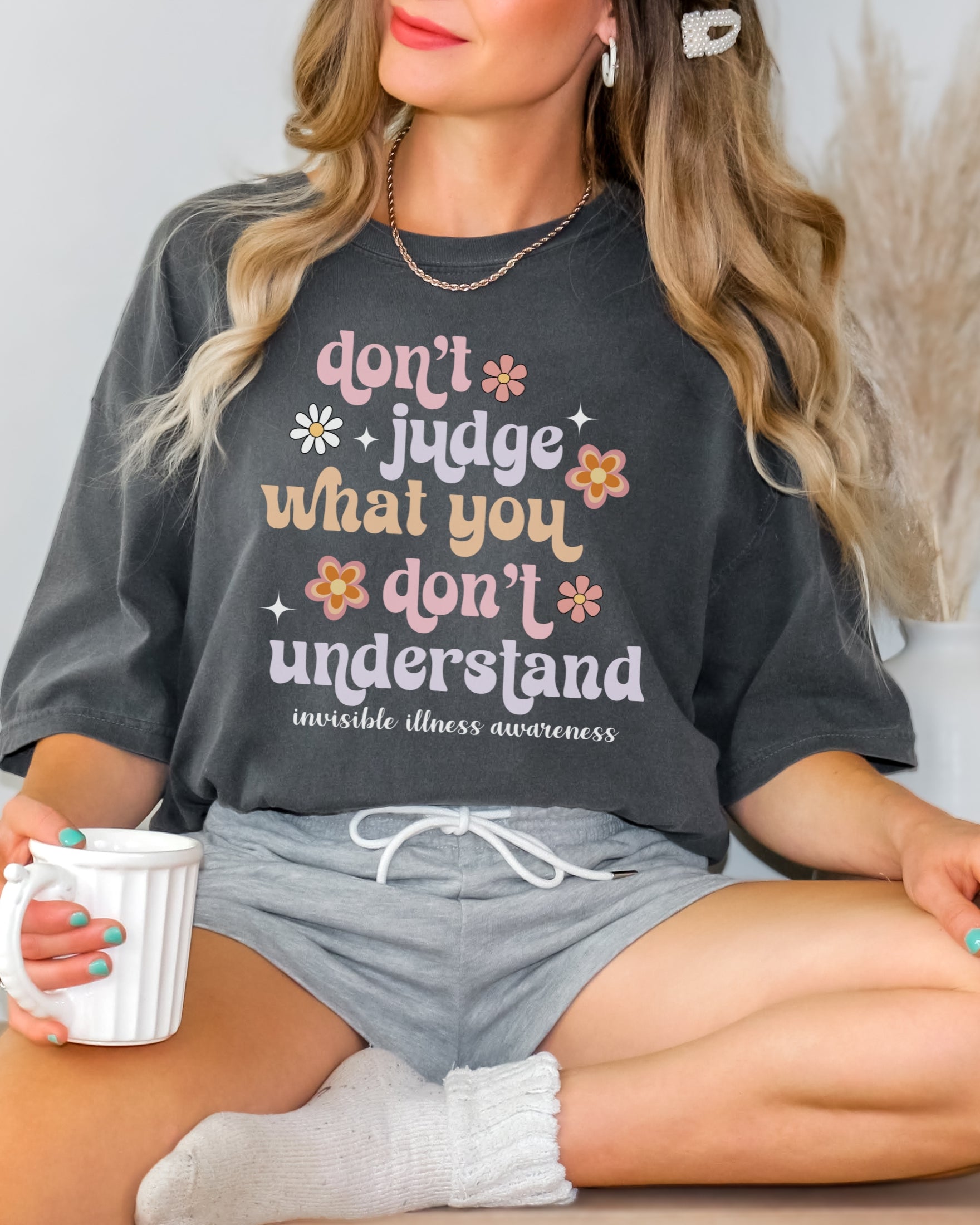 Girl wearing Comfort Colors invisible illness awareness shirt in pepper