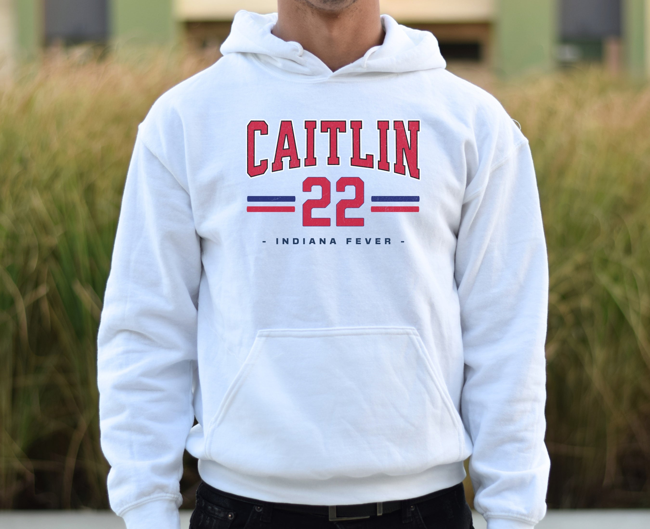Guy wearing white Caitlin Clark 22 Hoodie