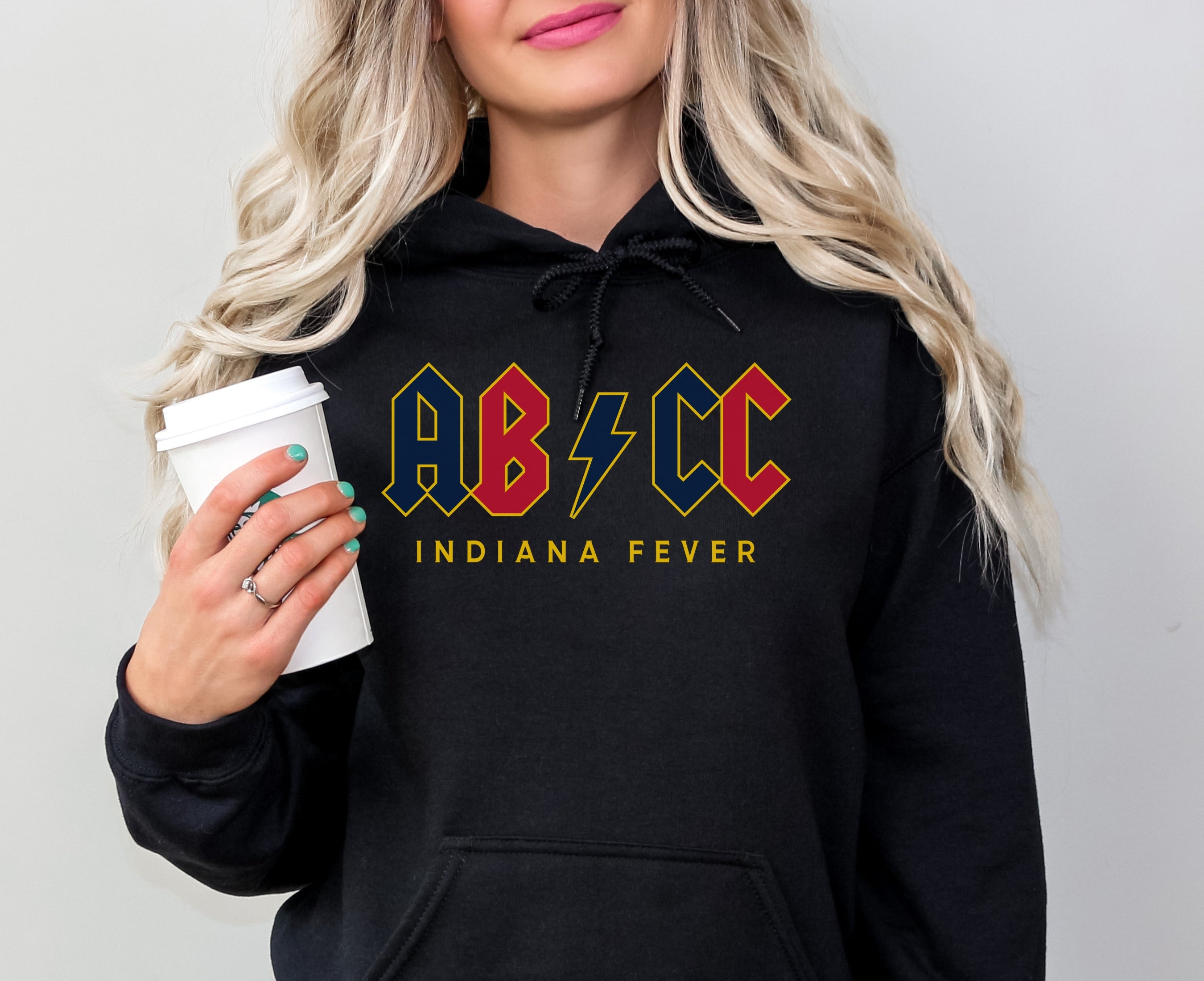 Girl wearing black Aliyah Boston Caitlin Clark hoodie