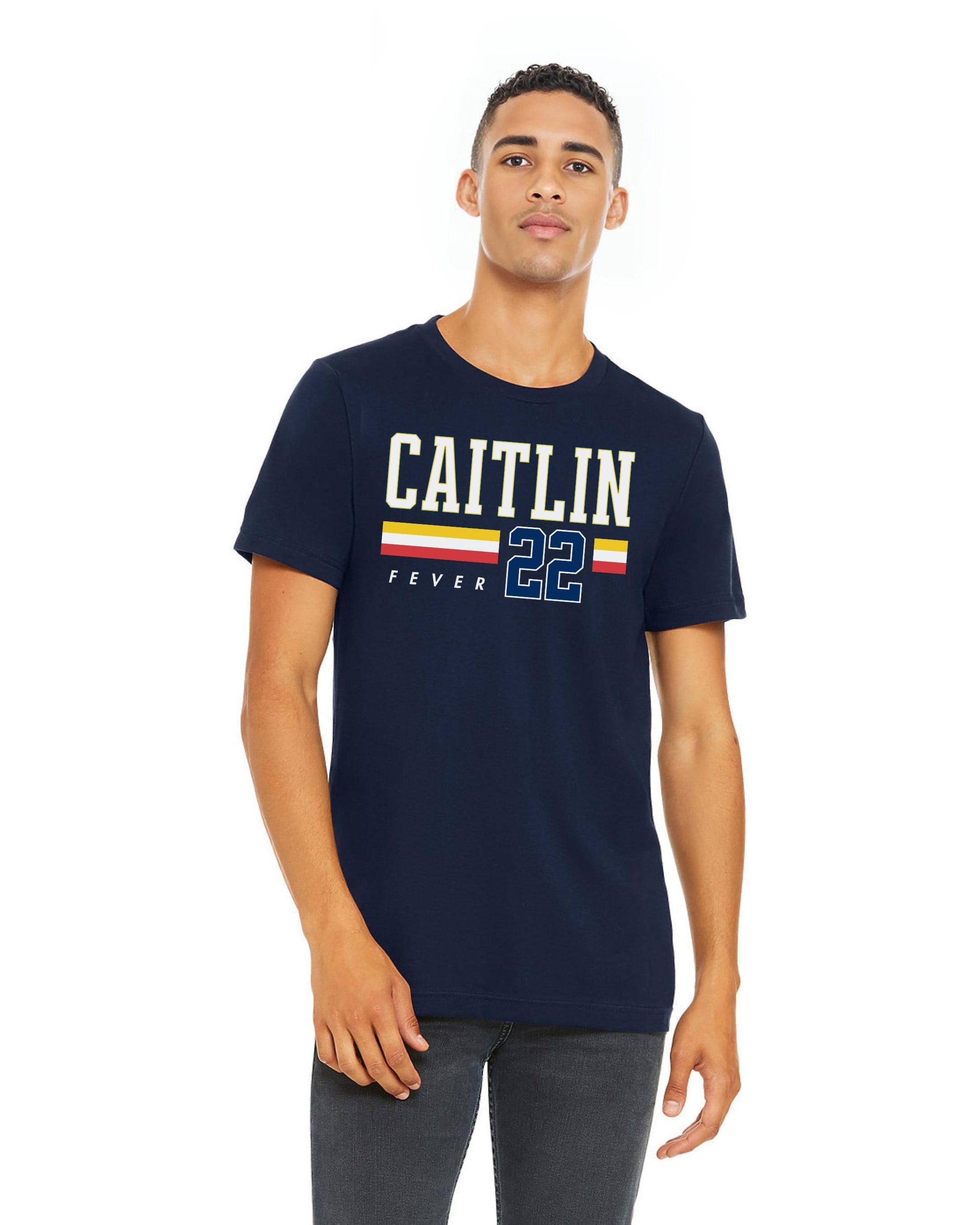 Person wearing t-shirt with 'CAITLIN FEVER' printed on it