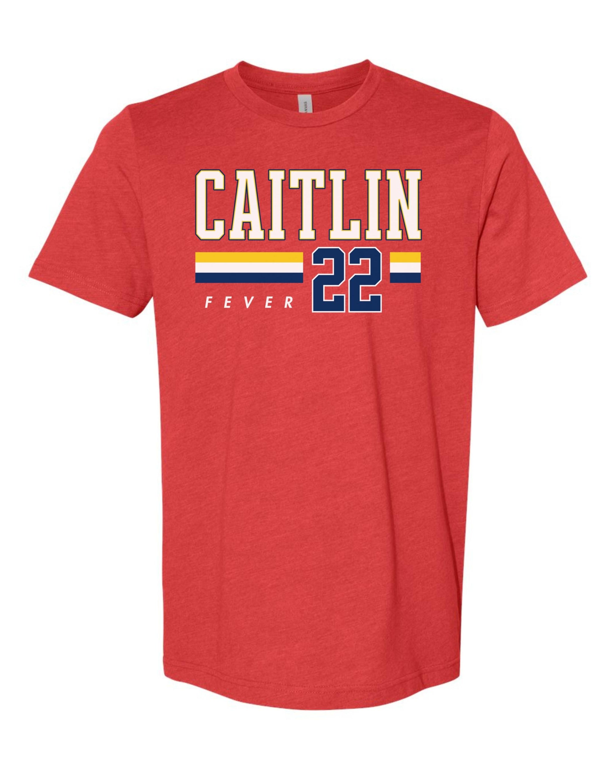 Person wearing t-shirt with 'CAITLIN FEVER' printed on it