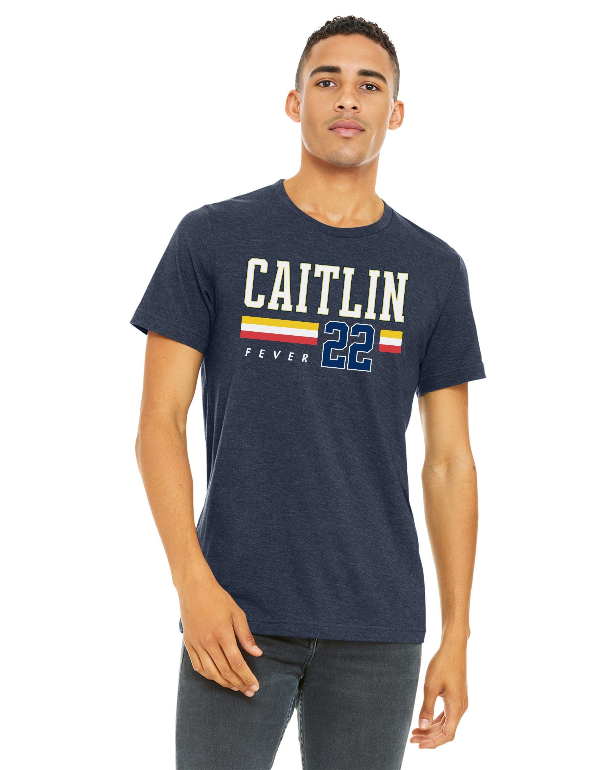Person wearing t-shirt with 'CAITLIN FEVER' printed on it