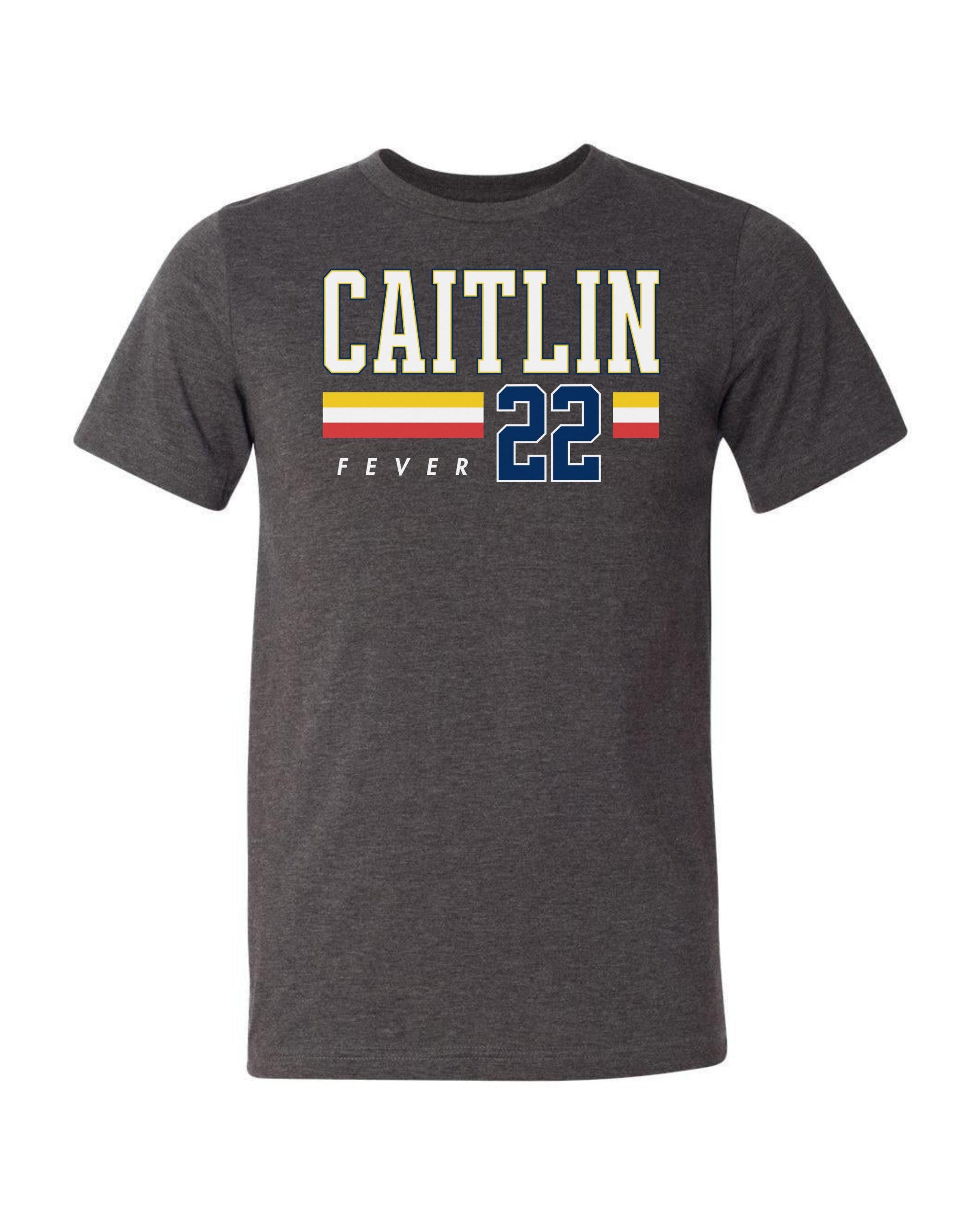 Person wearing t-shirt with 'CAITLIN FEVER' printed on it