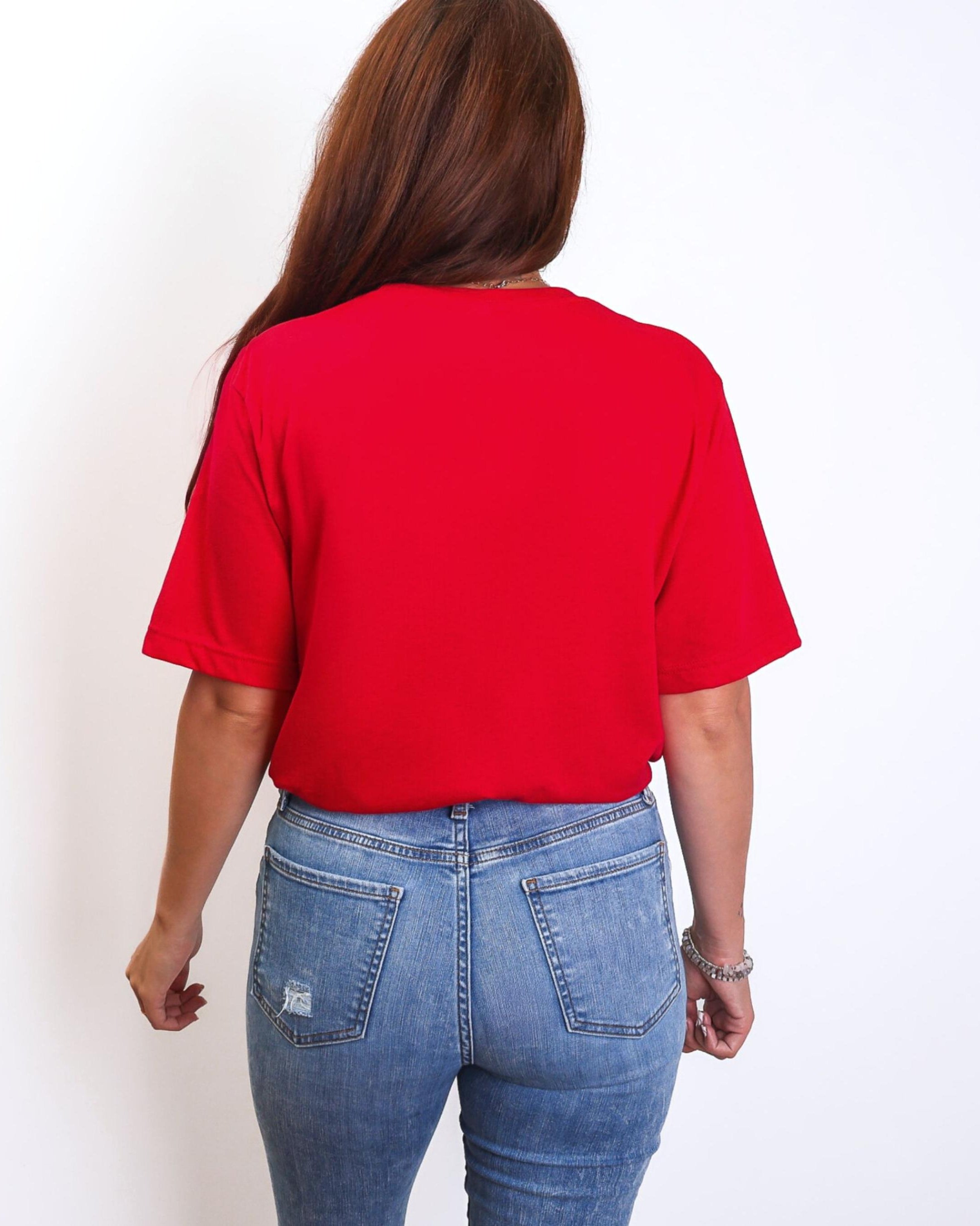 Person wearing t-shirt with 'CAITLIN FEVER' printed on it