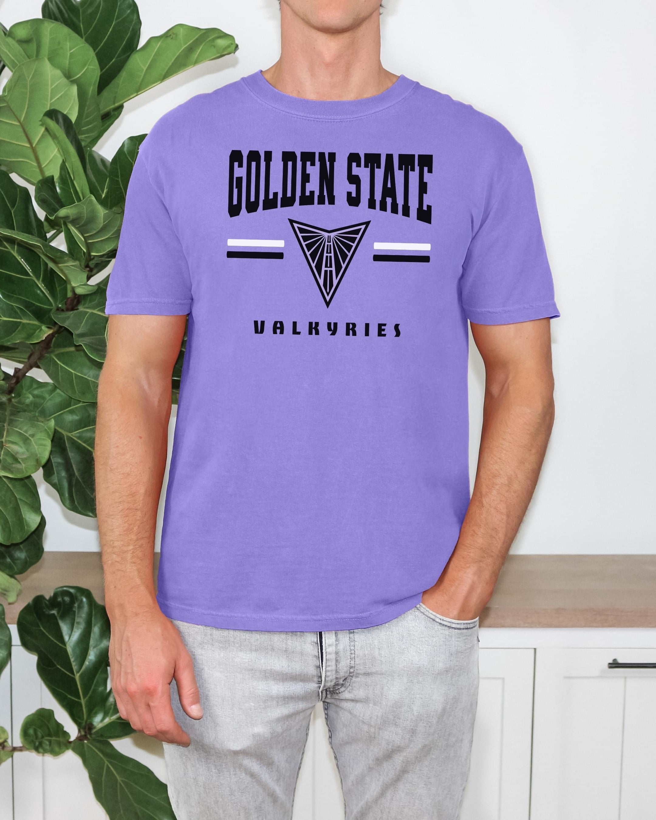 Person wearing a purple t-shirt with 'Golden State Valkyries' text and logo. #Violet