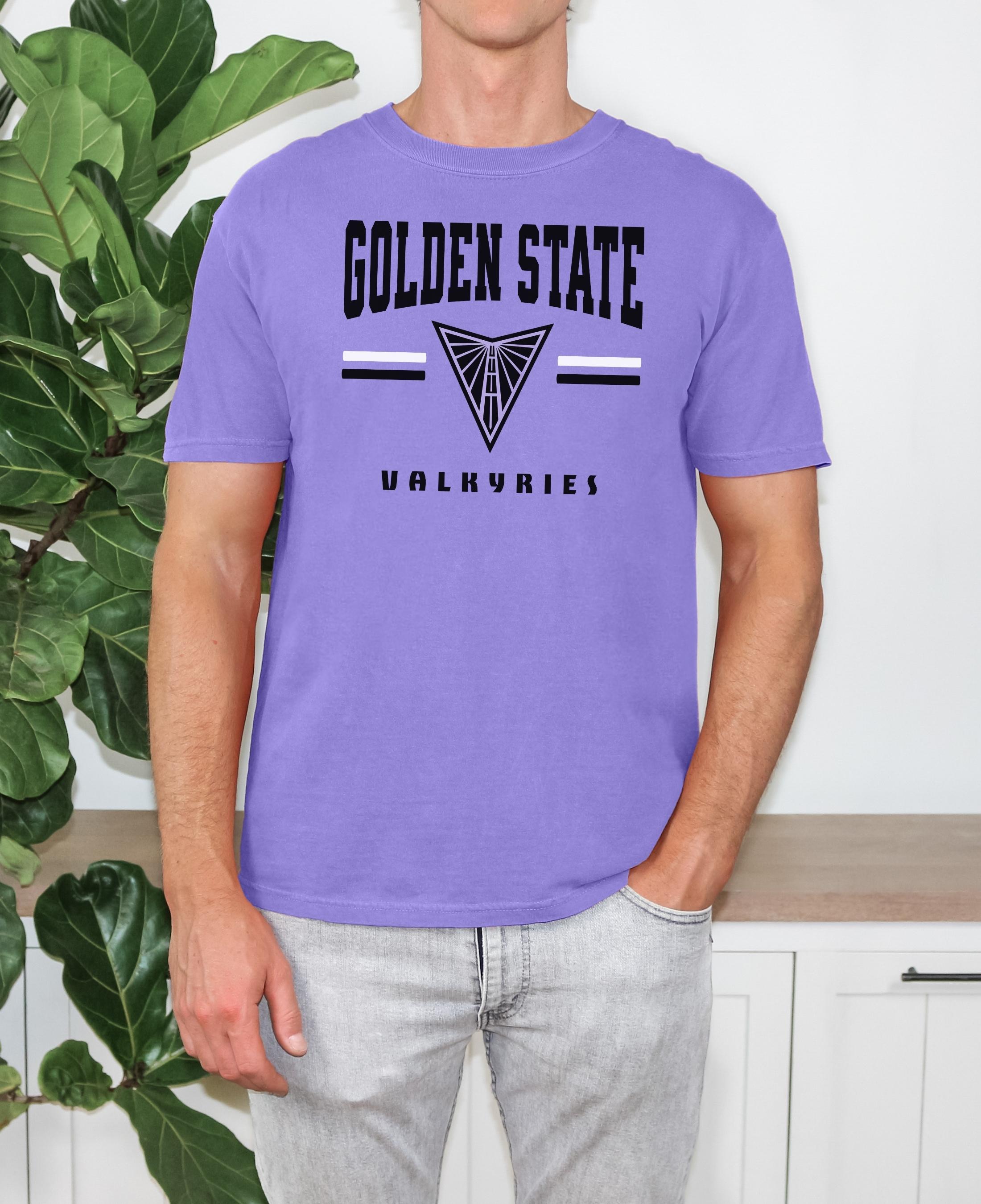 Person wearing a purple t-shirt with 'Golden State Valkyries' text and logo. #Violet