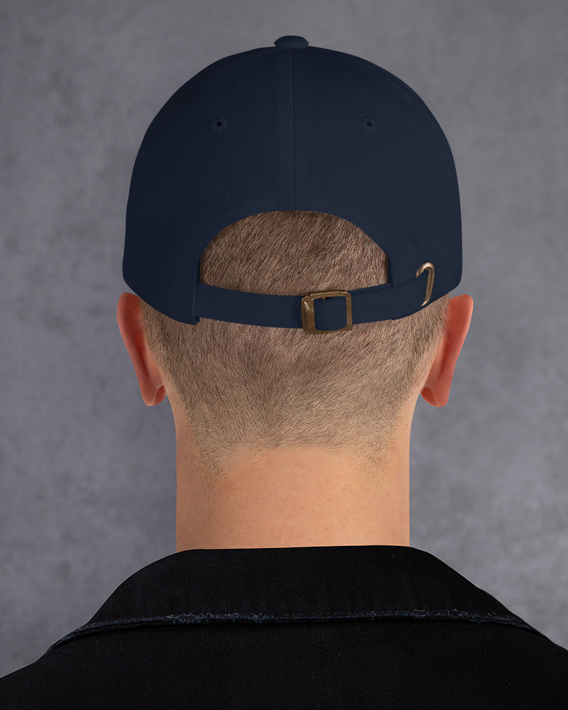 Back of man wearing navy cap