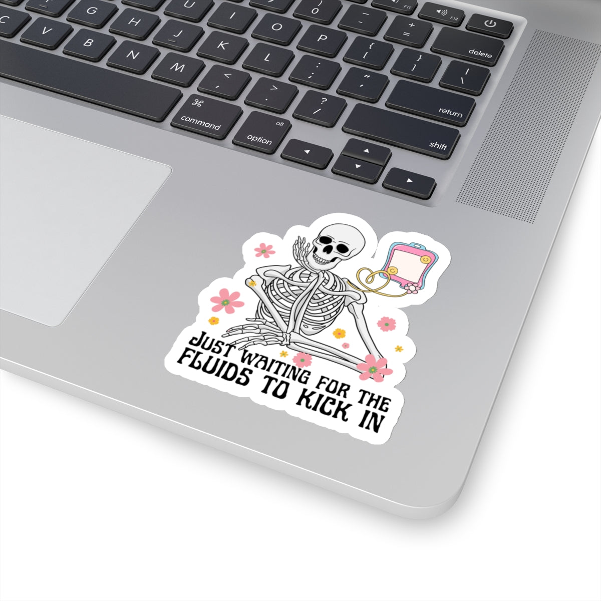 3 inch sticker on laptop of skeleton getting fluids through IV bag