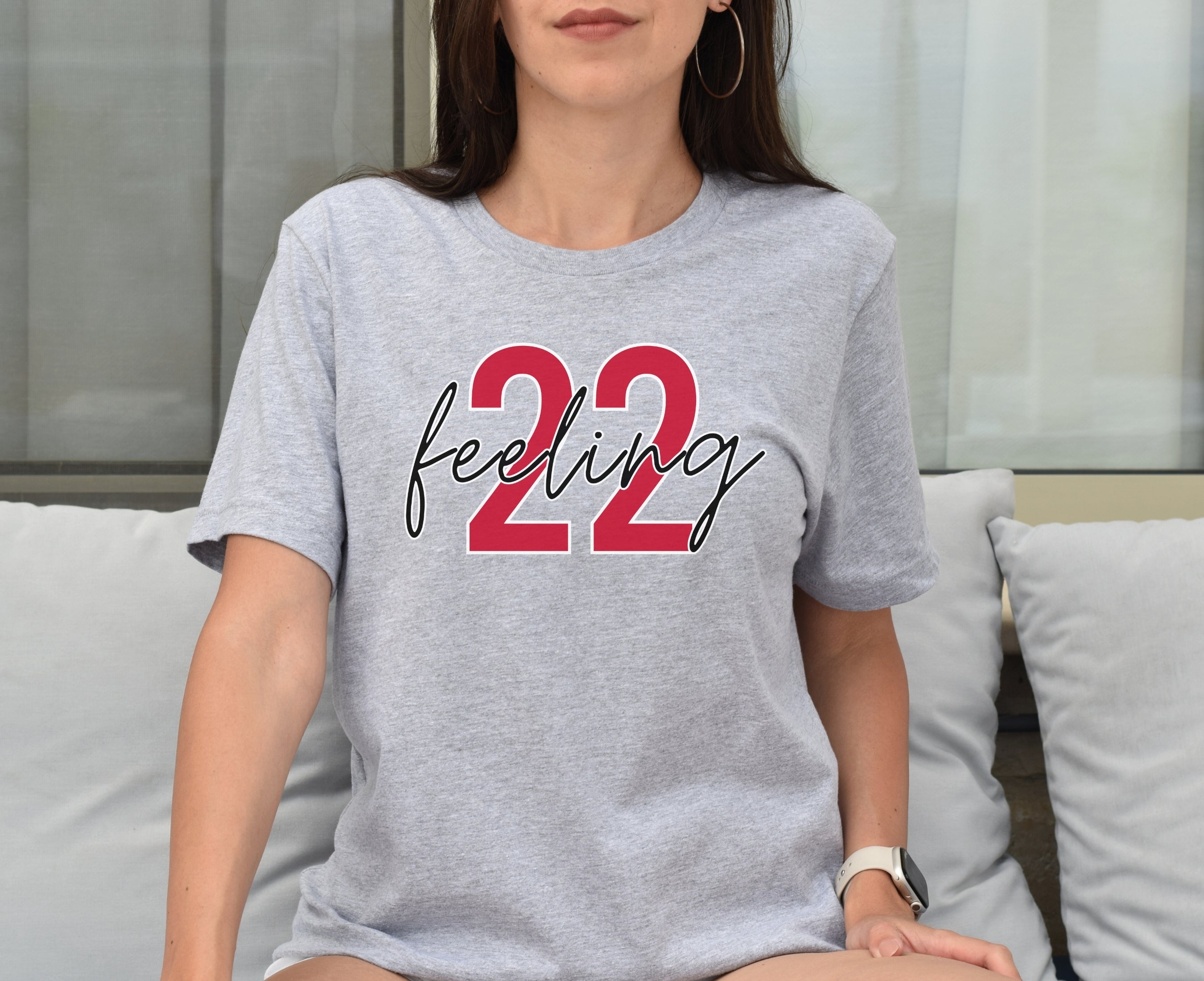 Girl wearing athletic heather feeling 22 t-shirt