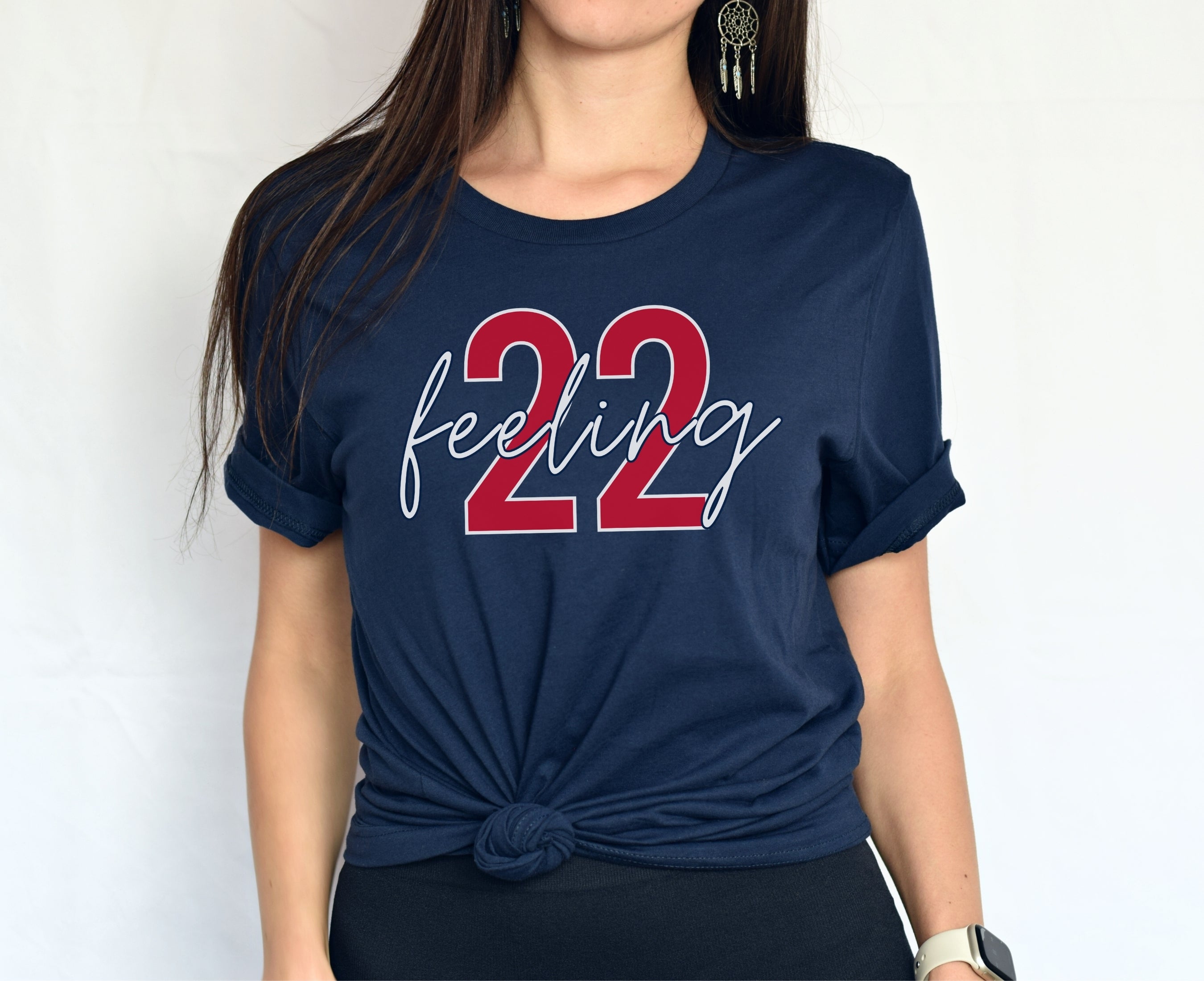 Girl wearing navy feeling 22 t-shirt