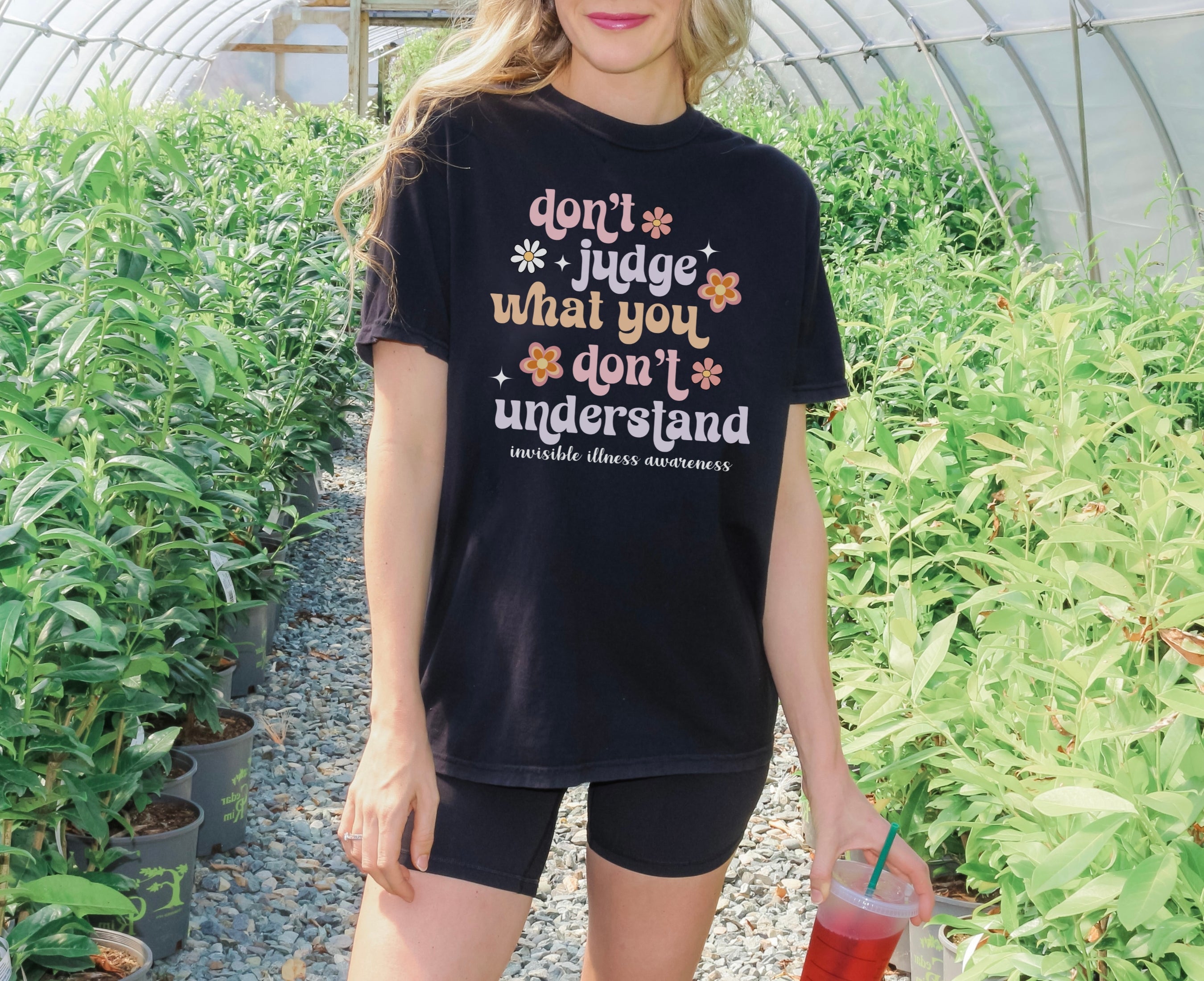 Girl wearing Comfort Colors invisible illness awareness shirt in black