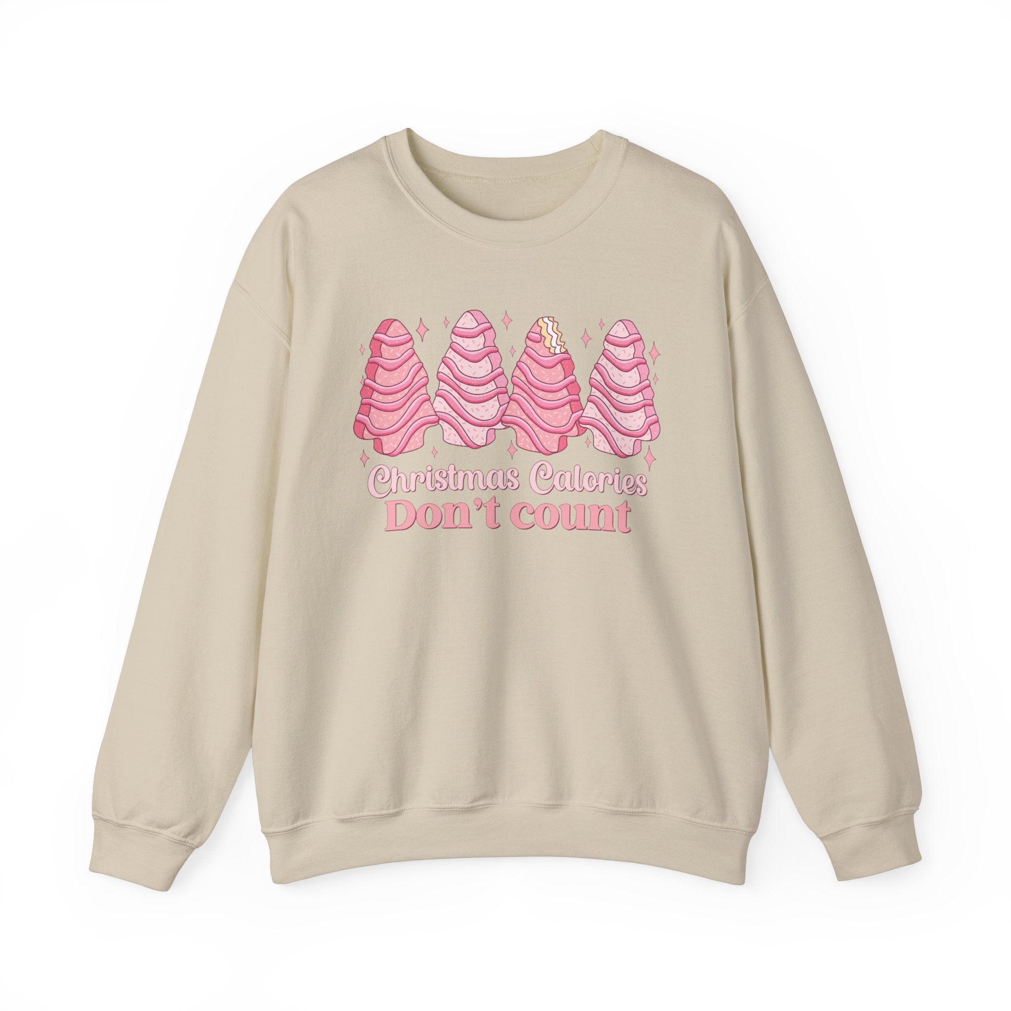 Sand sweatshirt with pink Christmas tree cakes on it