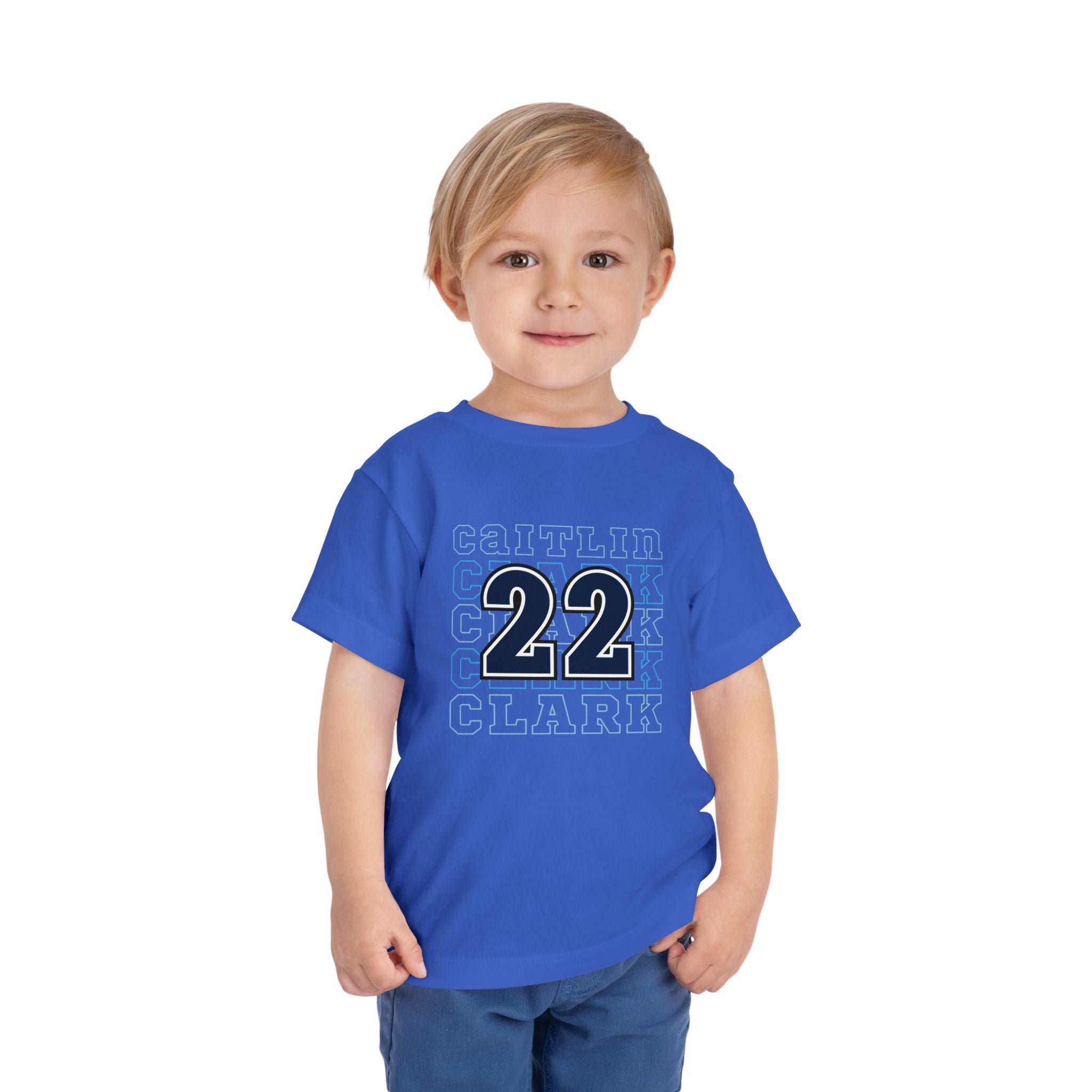 Little boy wearing true royal Caitlin Clark Number 22 Toddler tee