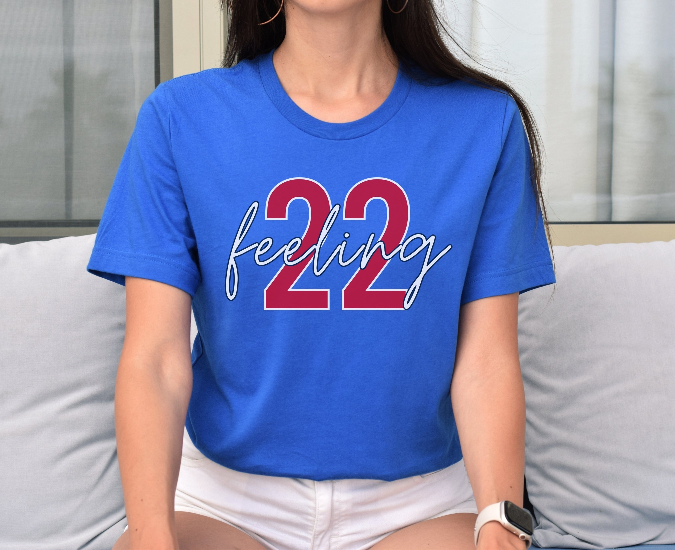 Woman wearing heather true royal feeling 22 t-shirt