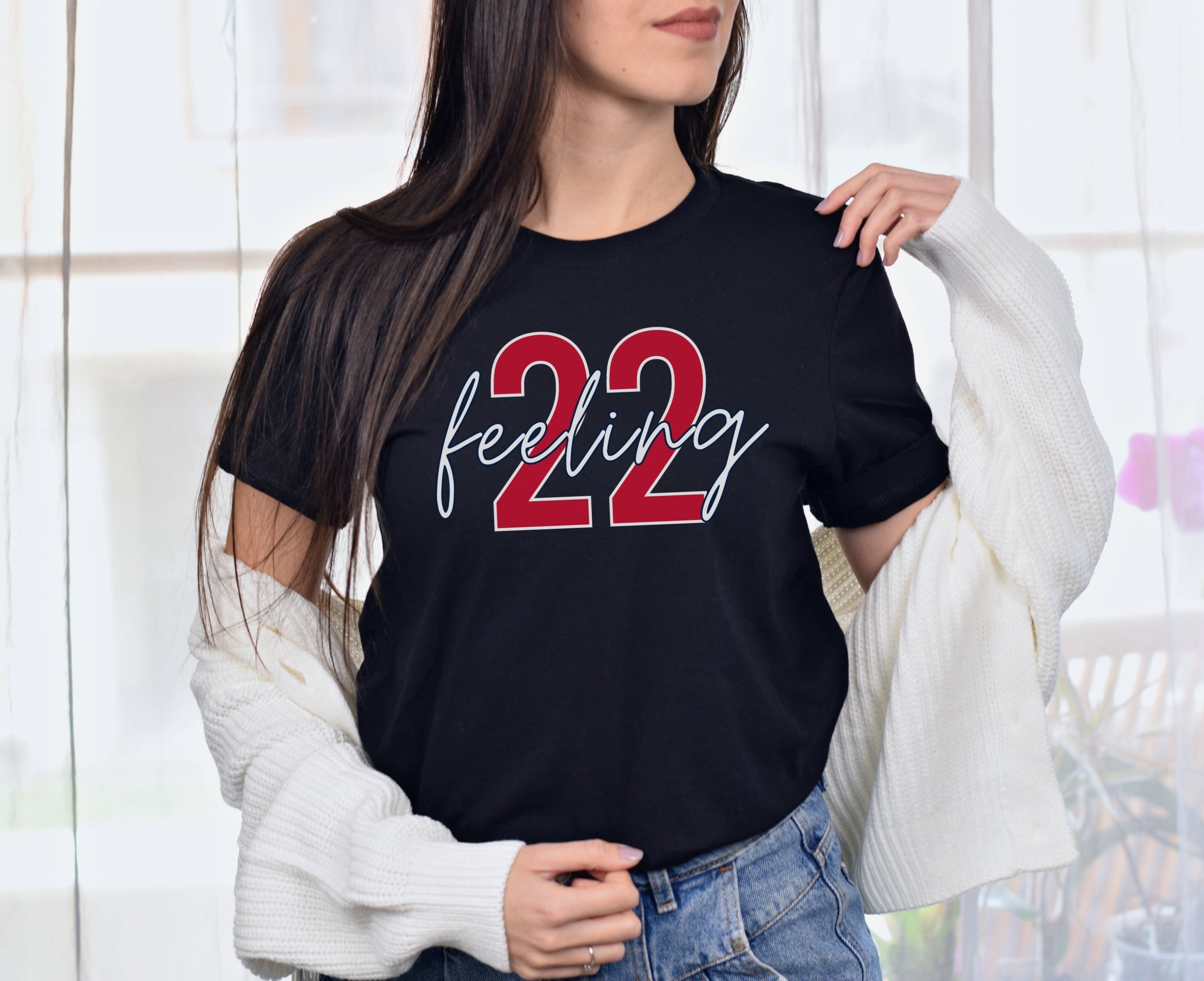 Girl wearing black feeling 22 t-shirt