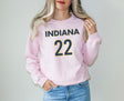 Girl wearing light pink Indiana 22 Caitlin Clark sweatshirt