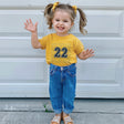 Little girl wearing heather yellow gold Caitlin Clark 22 Toddler T-Shirts