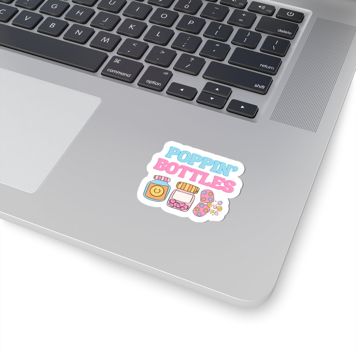 2 inch sticker of pill bottles on laptop