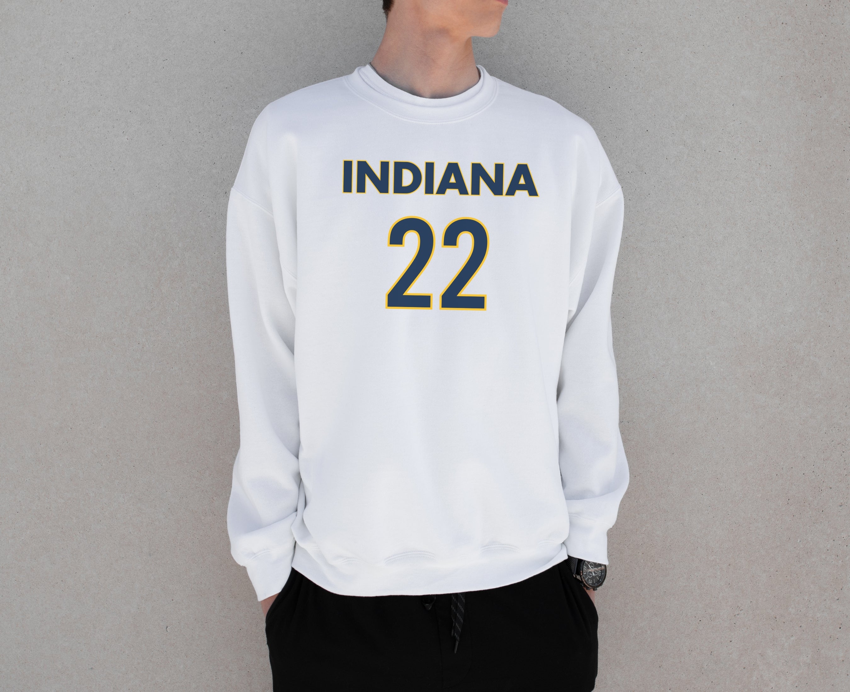 Man wearing white Indiana 22 sweatshirt
