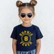 Child wearing a navy blue t-shirt with 'Sophie 8 Fever' text, heart-shaped sunglasses, and denim shorts on a white background.