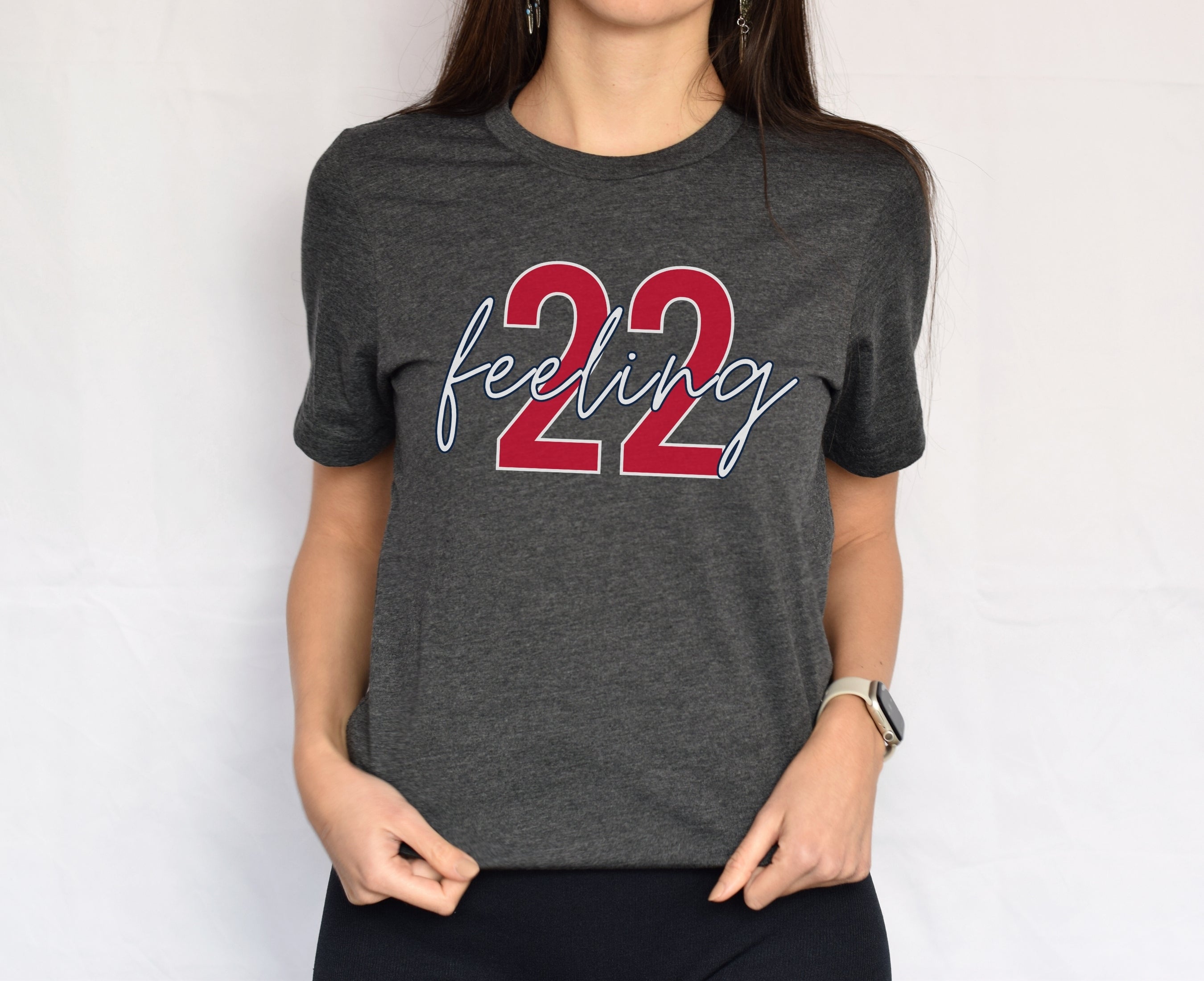 Girl wearing dark grey heather feeling 22 t-shirt