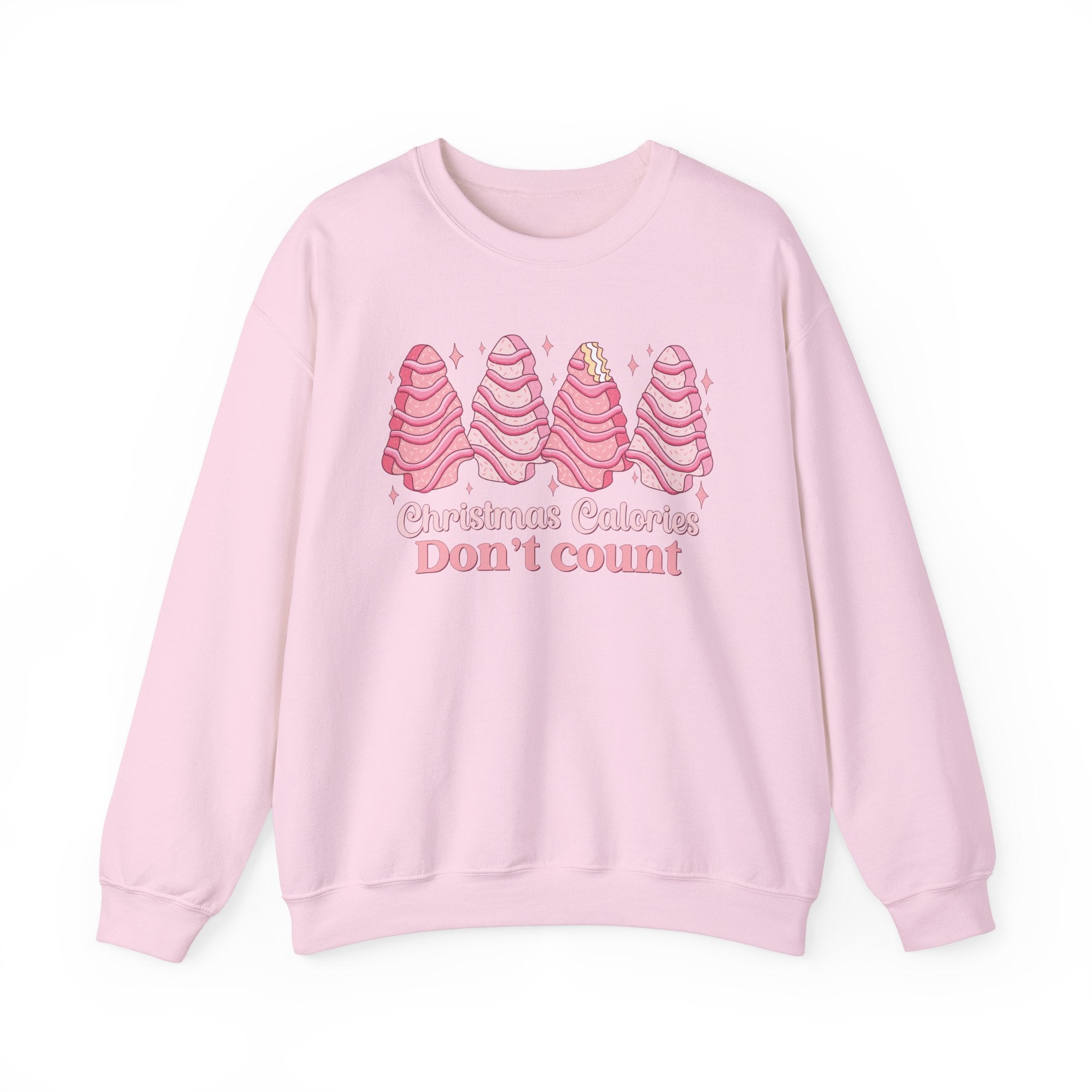 Pink sweatshirt with pink Christmas tree cakes on it