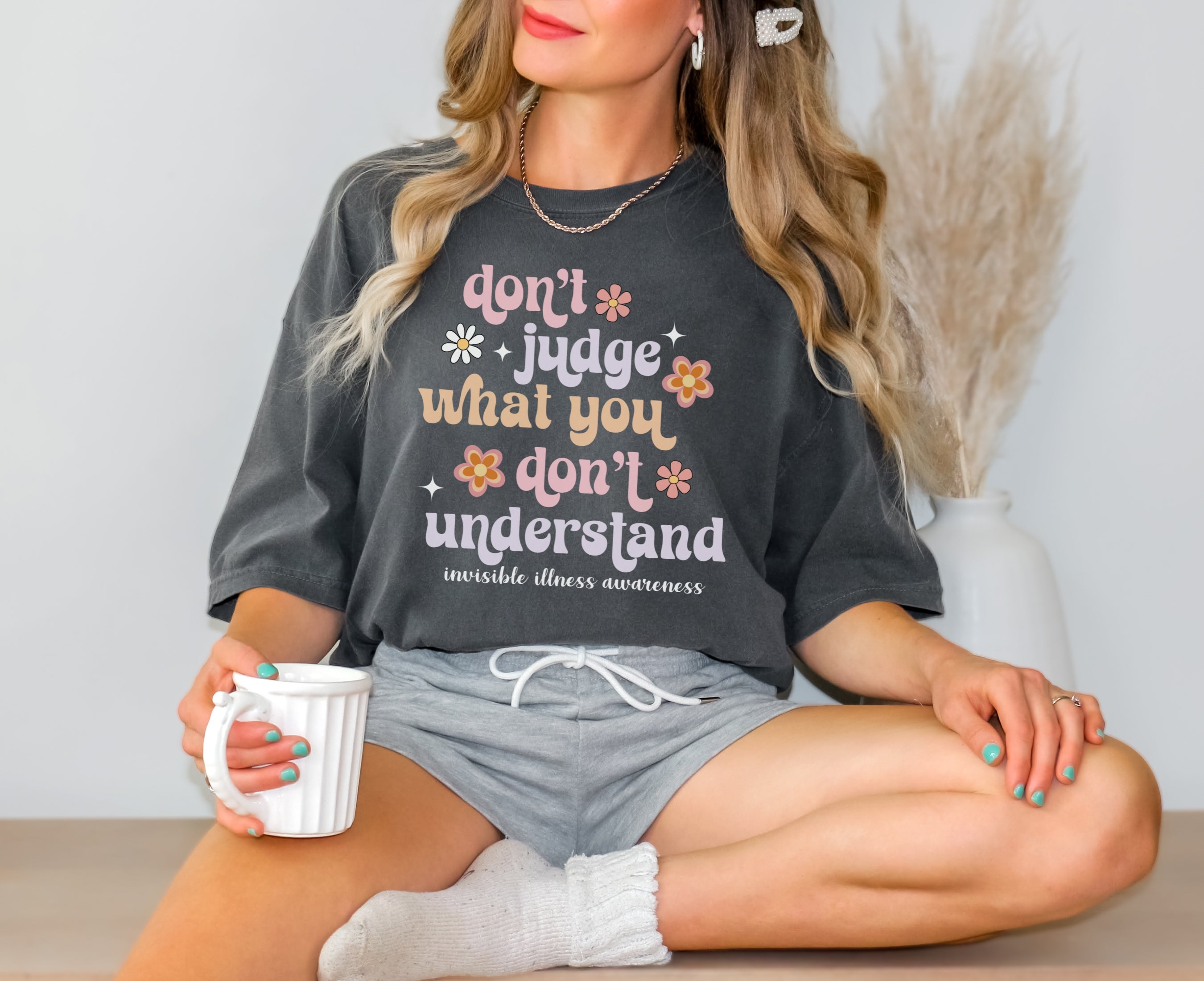 Girl wearing Comfort Colors invisible illness awareness shirt in pepper