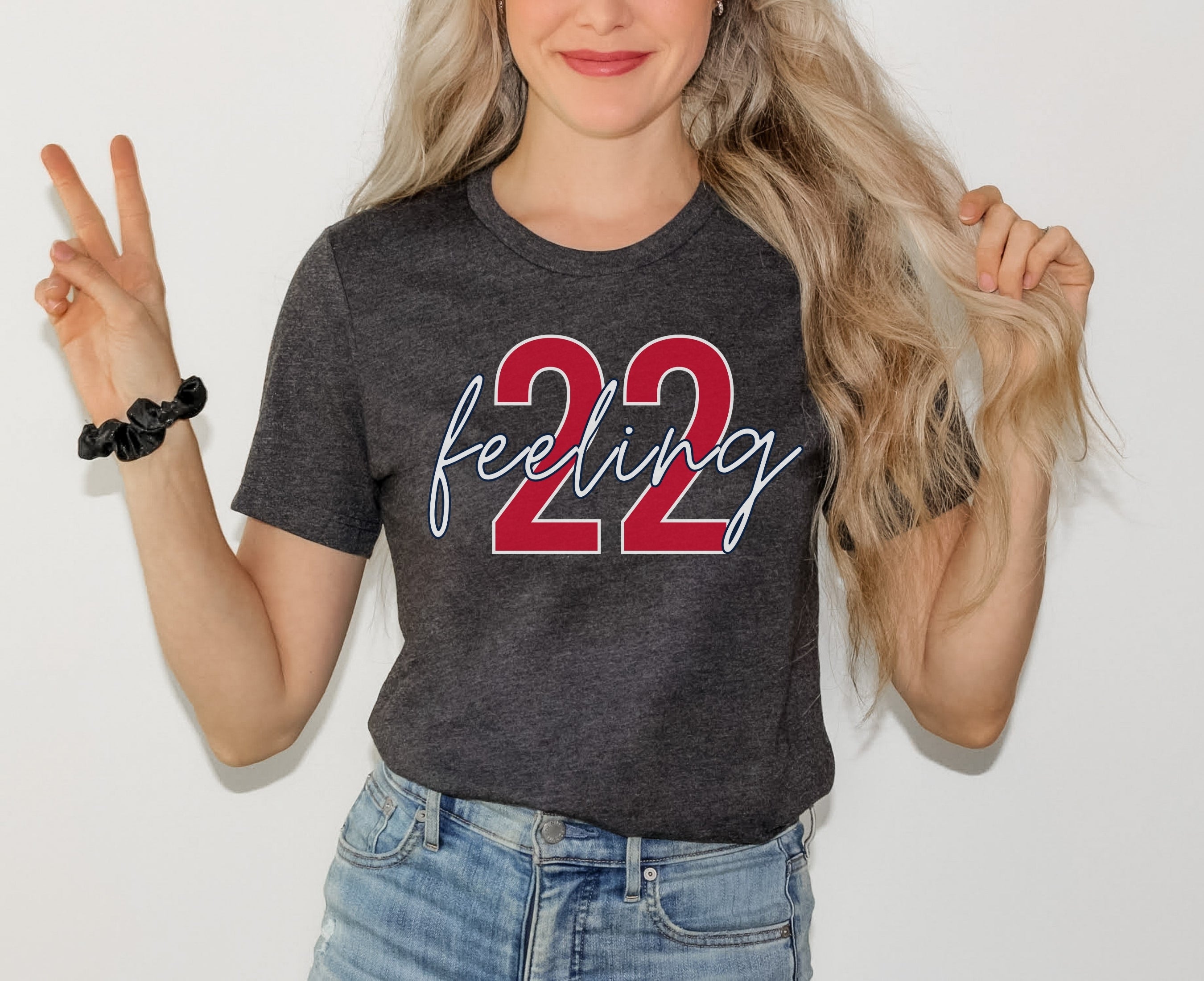 Girl wearing dark grey heather feeling 22 t-shirt