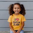 Little girl wearing I love Caitlin Clark heather yellow gold t-shirt