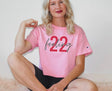 Girl wearing feeling 22 crop top in pink candy