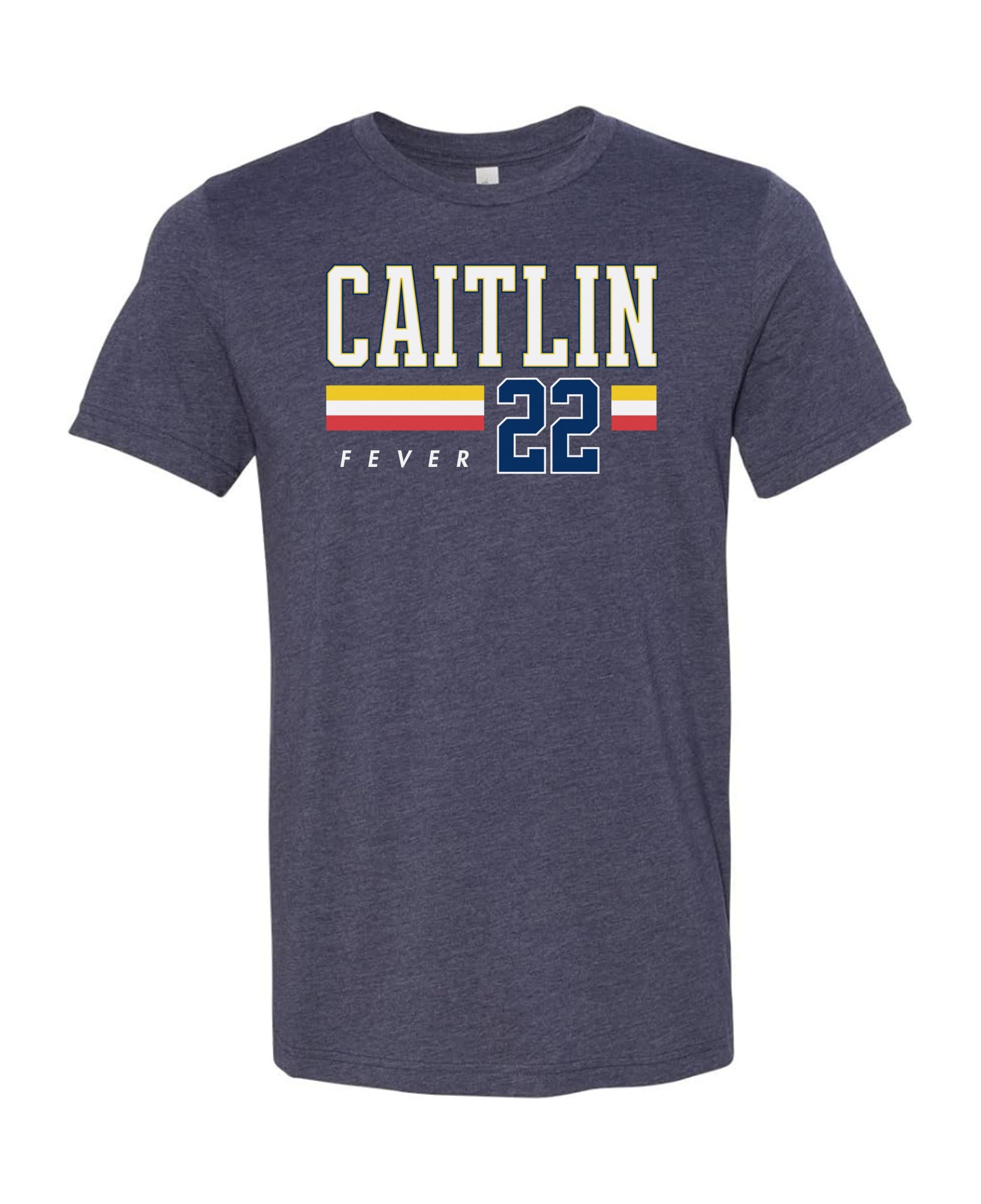 Person wearing t-shirt with 'CAITLIN FEVER' printed on it