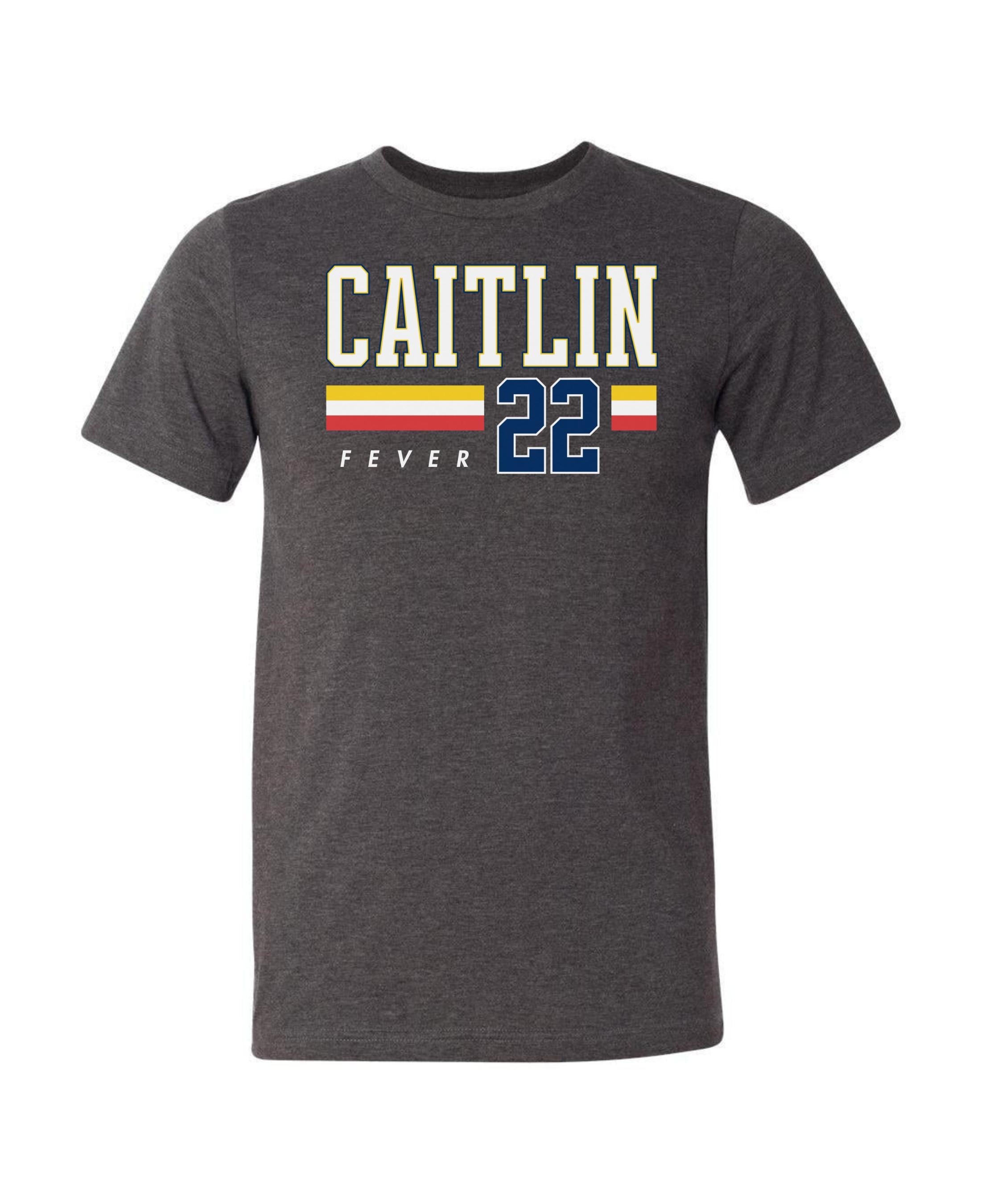 Person wearing t-shirt with 'CAITLIN FEVER' printed on it