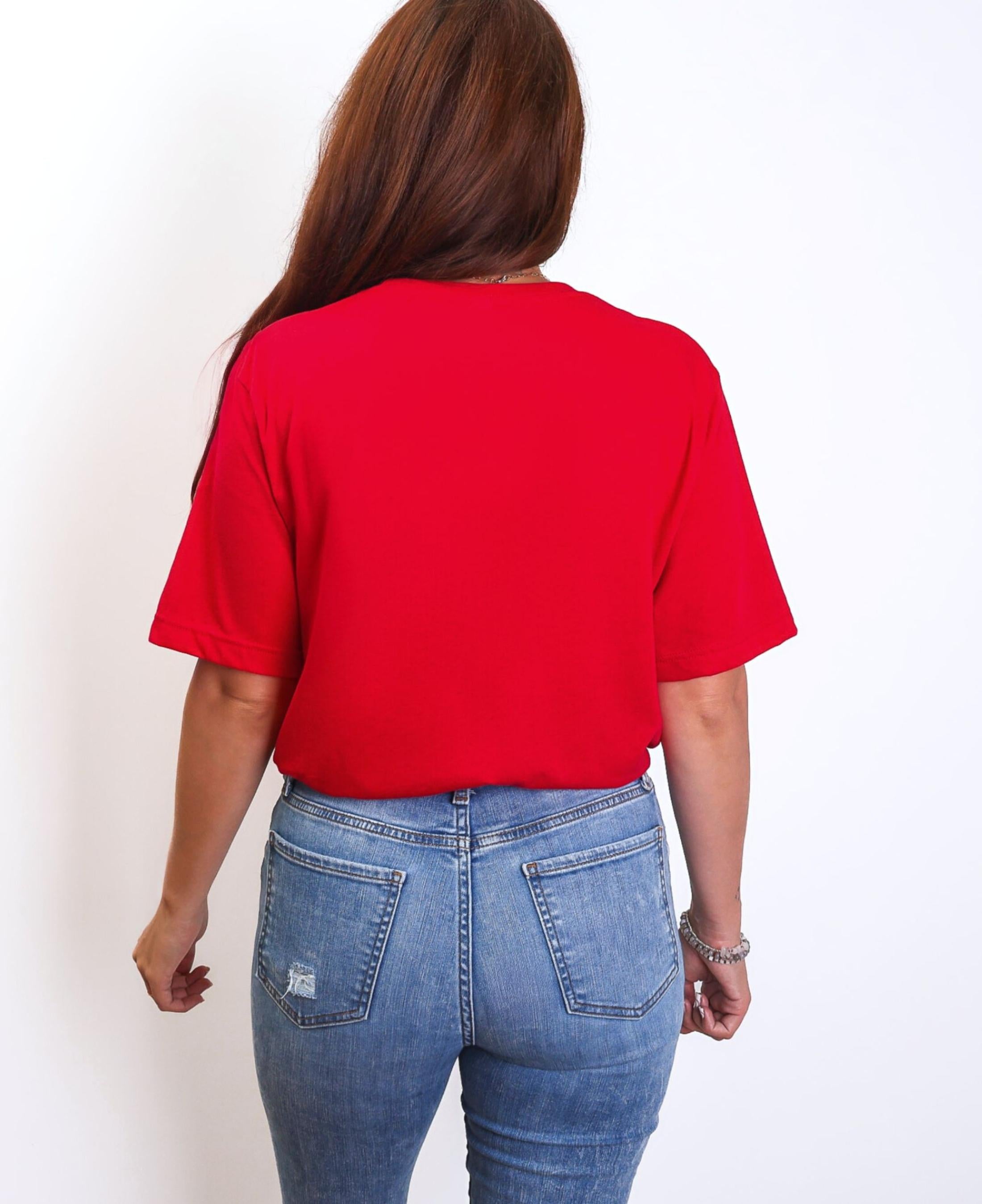Person wearing t-shirt with 'CAITLIN FEVER' printed on it