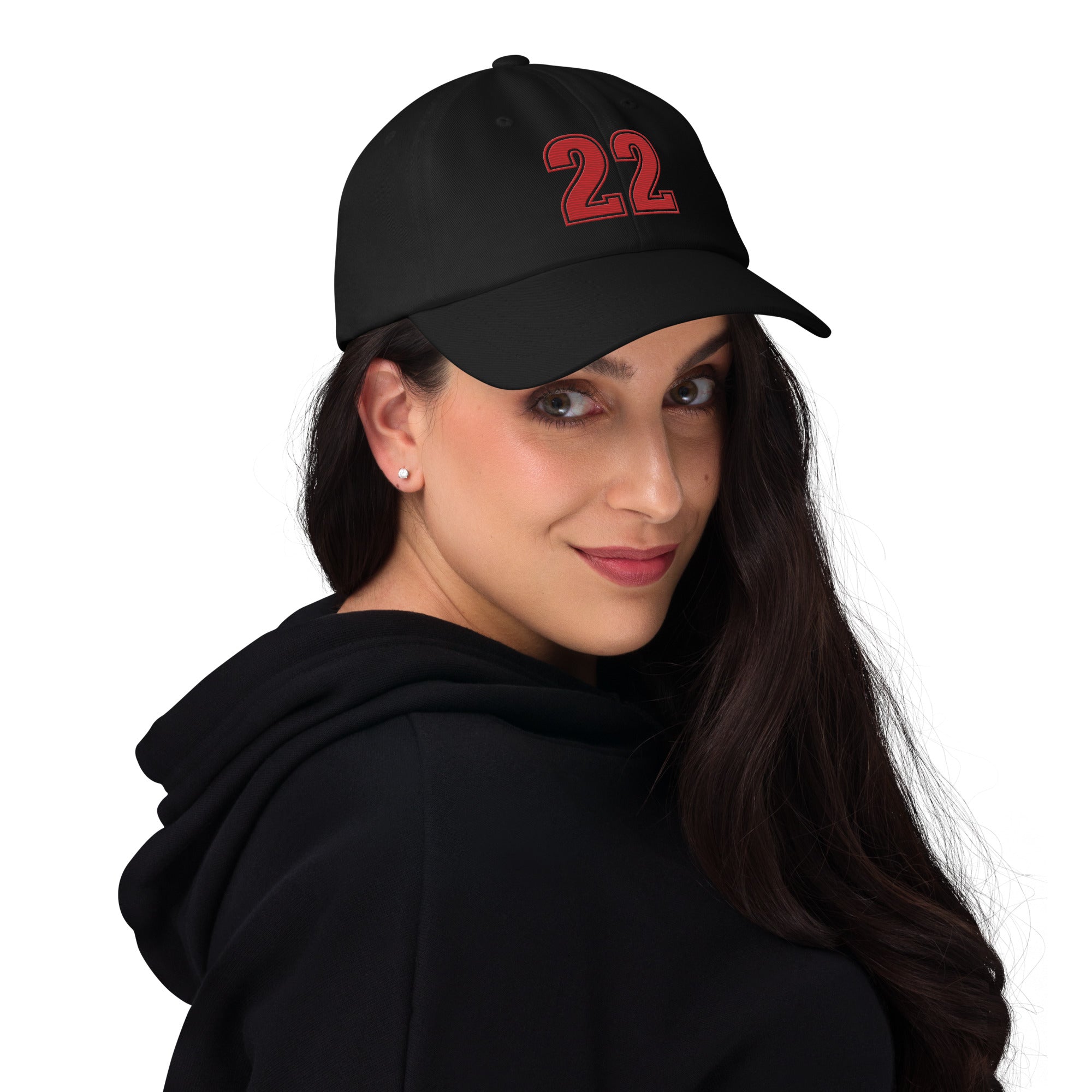 Girl wearing black number 22 dad hat